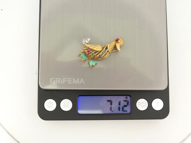 Broche Broche canard vintage en or jaune 18k, rubis, émeraudes et saphirs 58 Facettes 276295