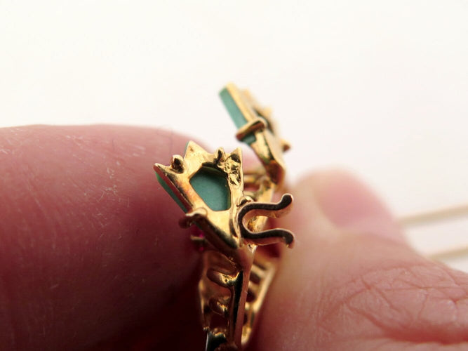Broche Broche canard vintage en or jaune 18k, rubis, émeraudes et saphirs 58 Facettes 276295