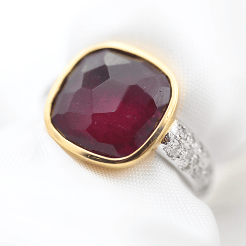 Bague 53 Pomellato Sheherazade - Bague en or jaune et blanc, grenat, diamants 58 Facettes 535F26_M