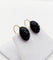 Boucles d'oreilles Dormeuses antiques en or 18k et cabochons de jais 58 Facettes A07866