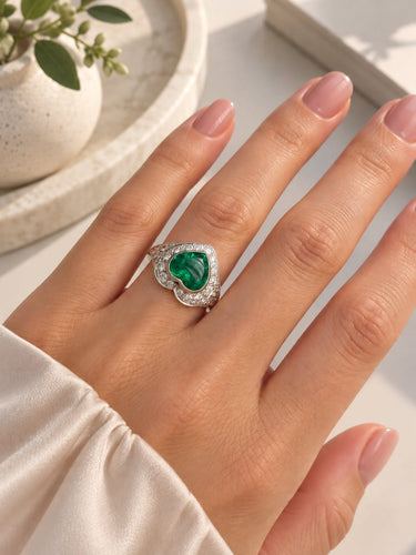 Bague 54 Bague vintage en platine avec émeraude colombienne cœur 58 Facettes 50533