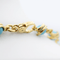 Collier Pomellato - Collier vintage en or jaune et turquoises 58 Facettes 535P26_M