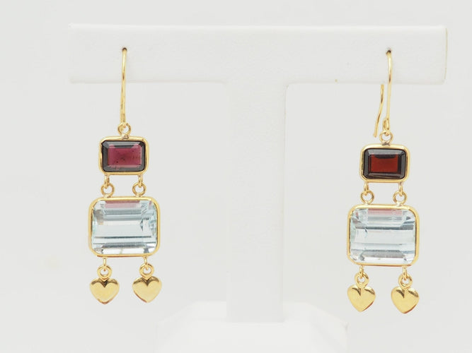 Boucles d'oreilles Boucles d'oreilles pendantes en or jaune 18K, aigues-marines et grenats 58 Facettes 32333