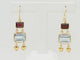 Boucles d'oreilles Boucles d'oreilles pendantes en or jaune 18K, aigues-marines et grenats 58 Facettes 32333