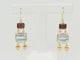 Boucles d'oreilles Boucles d'oreilles pendantes en or jaune 18K, aigues-marines et grenats 58 Facettes 32333