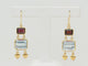 Boucles d'oreilles Boucles d'oreilles pendantes en or jaune 18K, aigues-marines et grenats 58 Facettes 32333