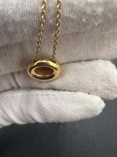 Collier Chaumet - Collier pendentif anneau en or jaune 18 carats 58 Facettes Collier-Chaumet