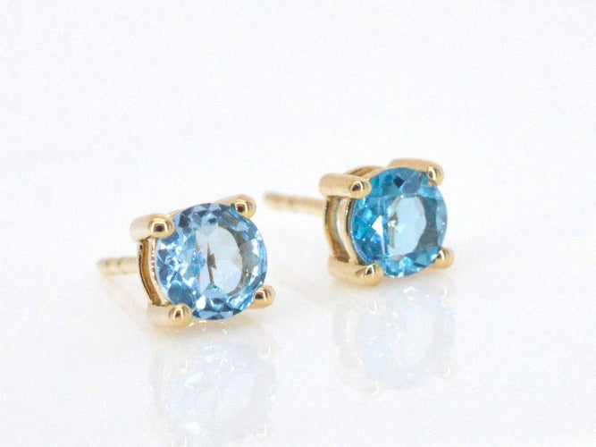 Boucles d'oreilles Boucles d'oreilles en or 14 carats avec topaze 58 Facettes 2399