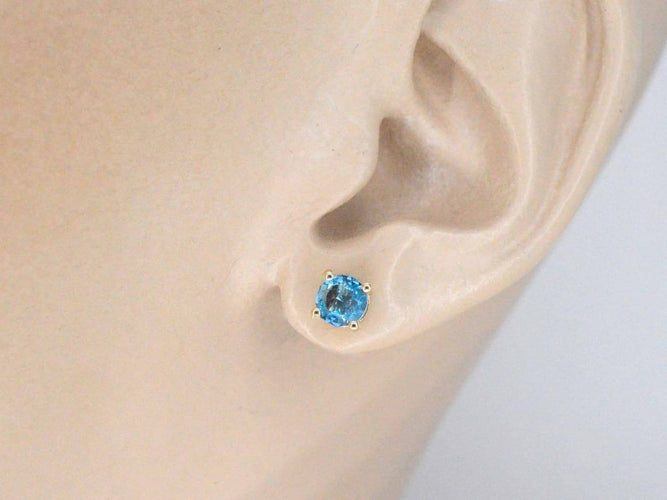 Boucles d'oreilles Boucles d'oreilles en or 14 carats avec topaze 58 Facettes 2399