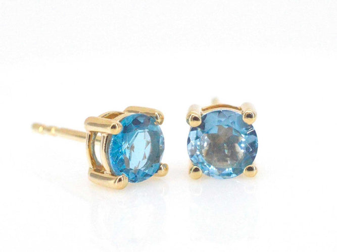Boucles d'oreilles Boucles d'oreilles en or 14 carats avec topaze 58 Facettes 2399
