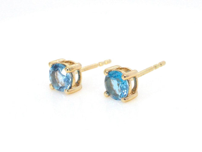 Boucles d'oreilles Boucles d'oreilles en or 14 carats avec topaze 58 Facettes 2399
