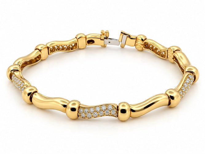 Bracelet Boucheron - Bracelet vintage en or jaune 18 carats et diamants 58 Facettes Bc