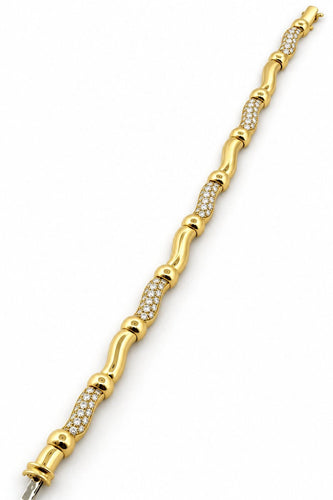 Bracelet Boucheron - Bracelet vintage en or jaune 18 carats et diamants 58 Facettes Bc