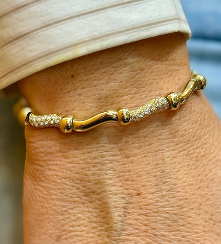 Bracelet Boucheron - Bracelet vintage en or jaune 18 carats et diamants 58 Facettes Bc