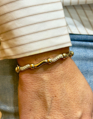 Bracelet Boucheron - Bracelet vintage en or jaune 18 carats et diamants 58 Facettes Bc
