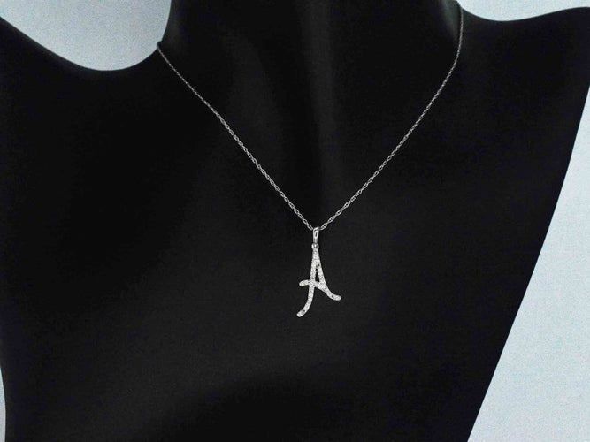 Pendentif Pendentif lettre A en or 14 carats et diamants 58 Facettes 2404