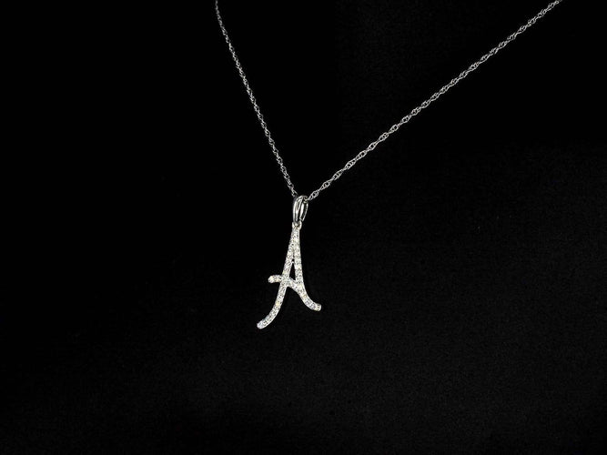 Pendentif Pendentif lettre A en or 14 carats et diamants 58 Facettes 2404