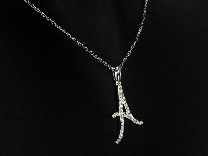 Pendentif Pendentif lettre A en or 14 carats et diamants 58 Facettes 2404