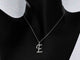 Pendentif Pendentif lettre E en or 14k et diamants naturels 58 Facettes 2406