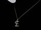 Pendentif Pendentif lettre E en or 14k et diamants naturels 58 Facettes 2406