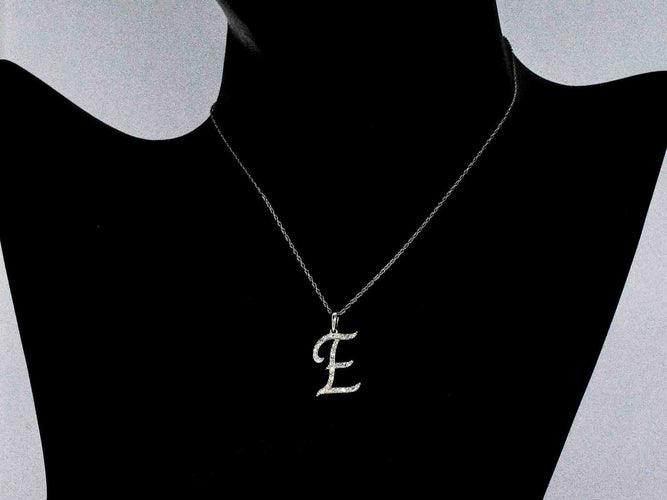 Pendentif Pendentif lettre E en or 14k et diamants naturels 58 Facettes 2406