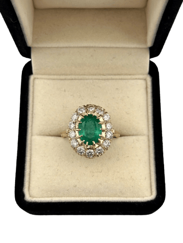 Bague en or jaune 18 kt, émeraude et diamants