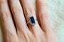 https://cdn.shopify.com/s/files/1/0963/7950/2920/files/bague-octogonale-art-deco-en-or-blanc-sertie-d-un-saphir-synthetique-verneuil-et-de-diamants-taille-rose-bague-eco-responsable.jpg?v=1790672279