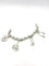 Bracelet Gaétan de Percin - Bracelet breloques vintage en argent 58 Facettes DEPER BRA 1055