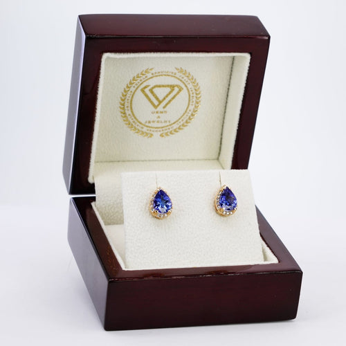 Boucles d'oreilles Boucles d'oreilles en or jaune 18 kt, tanzanites et diamants 58 Facettes E0055