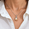 Pendentif Pendentif en or blanc 18K, perle australienne dorée et diamants 58 Facettes CL181