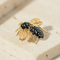 Broche Broche abeille vintage en or jaune 585 et saphirs 58 Facettes HJ062669