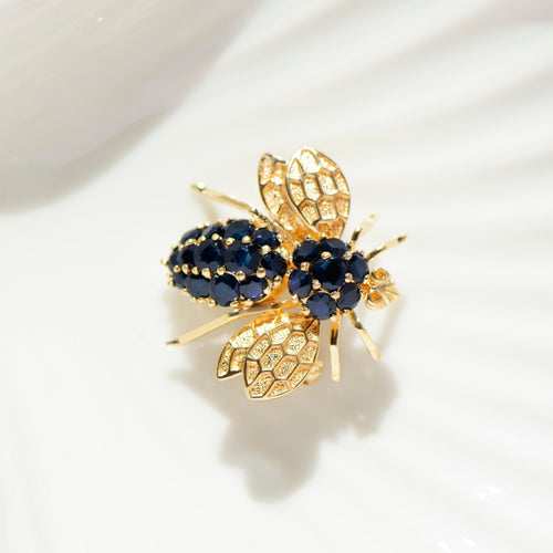 Broche Broche abeille vintage en or jaune 585 et saphirs 58 Facettes HJ062669
