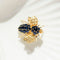 Broche Broche abeille vintage en or jaune 585 et saphirs 58 Facettes HJ062669