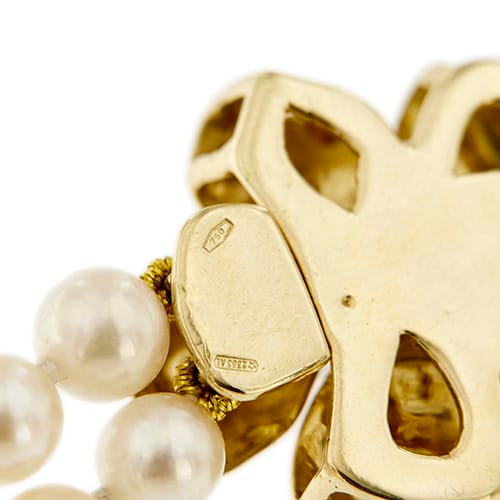 Bracelet Bracelet double rang de perles et diamants en or jaune 18 ct 58 Facettes 27351