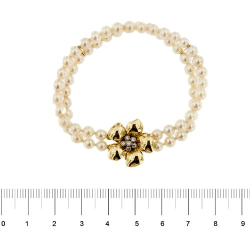 Bracelet Bracelet double rang de perles et diamants en or jaune 18 ct 58 Facettes 27351