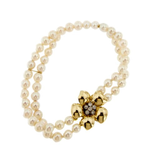 Bracelet Bracelet double rang de perles et diamants en or jaune 18 ct 58 Facettes 27351