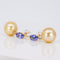 Boucles d'oreilles Boucles d'oreilles en or jaune 18 kt, tanzanites, perles et diamants 58 Facettes R0059