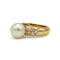 Bague 52 Bague en or jaune 18K, diamants et perle 58 Facettes SA045