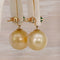 Boucles d'oreilles Boucles d'oreilles en or jaune 14k, émeraudes et perles des mers du Sud 58 Facettes E0065
