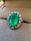 Bague 53 Bague Pompadour en or blanc, émeraude et diamants 58 Facettes BM244