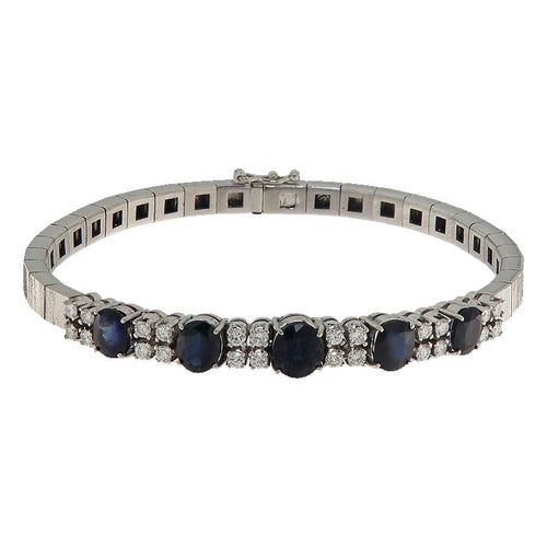 Bracelet Bracelet semi-rigide en or blanc 18 kt, diamants et saphirs 58 Facettes G4040