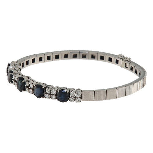 Bracelet Bracelet semi-rigide en or blanc 18 kt, diamants et saphirs 58 Facettes G4040