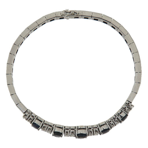 Bracelet Bracelet semi-rigide en or blanc 18 kt, diamants et saphirs 58 Facettes G4040