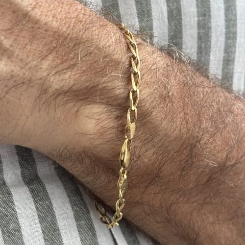 Bracelet Bracelet homme maille cheval en or jaune 18 ct 58 Facettes 33649