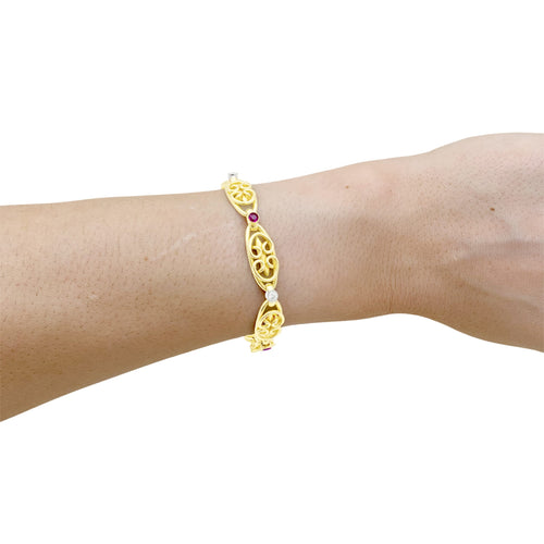 Bracelet Début XXe - Bracelet en or jaune, platine, rubis et diamants 58 Facettes 36051