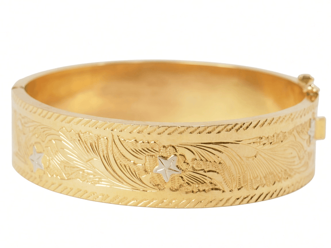 Bracelet Bracelet esclave ouvrant des années 1950 en or jaune et blanc 18 carats 58 Facettes 32206
