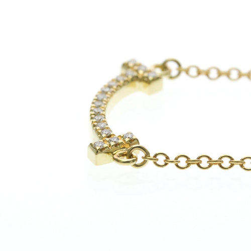 Pendentif Tiffany & Co. - Pendentif T Smile en or jaune 18k avec diamants 58 Facettes khutd02mx2