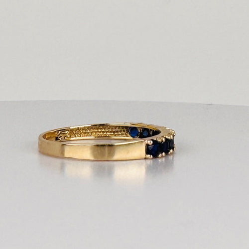 https://cdn.shopify.com/s/files/1/0829/5212/6812/files/Vintage_14K_Yellow_Gold_Eight_Blue_Sapphire_Band_Ring_2.jpg?v=1791297311
