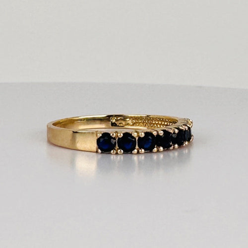 https://cdn.shopify.com/s/files/1/0829/5212/6812/files/Vintage_14K_Yellow_Gold_Eight_Blue_Sapphire_Band_Ring_1.jpg?v=1791297311
