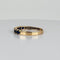 https://cdn.shopify.com/s/files/1/0829/5212/6812/files/Vintage_14K_Yellow_Gold_Eight_Blue_Sapphire_Band_Ring_4.jpg?v=1791297311